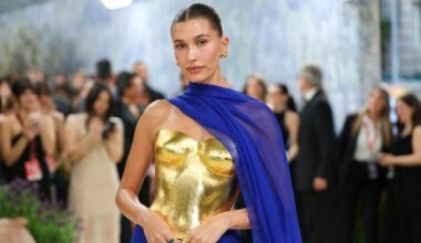 Hailey Bieber shows off toned abs in bikini for Rhode campaign photos