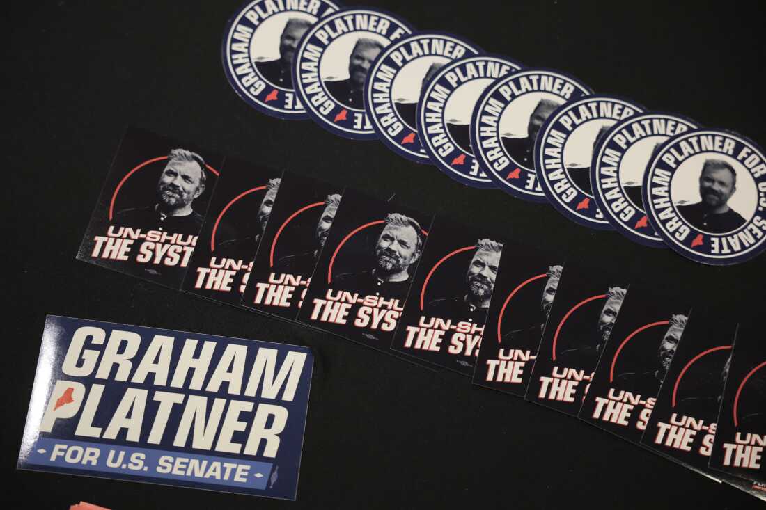 Campaign stickers for Democratic U.S. Senate candidate Graham Platner sit on a table during a “Fighting Oligarchy” tour stop held by Sen. Bernie Sanders (I-VT) on May 24, 2026 in Orono, Maine.