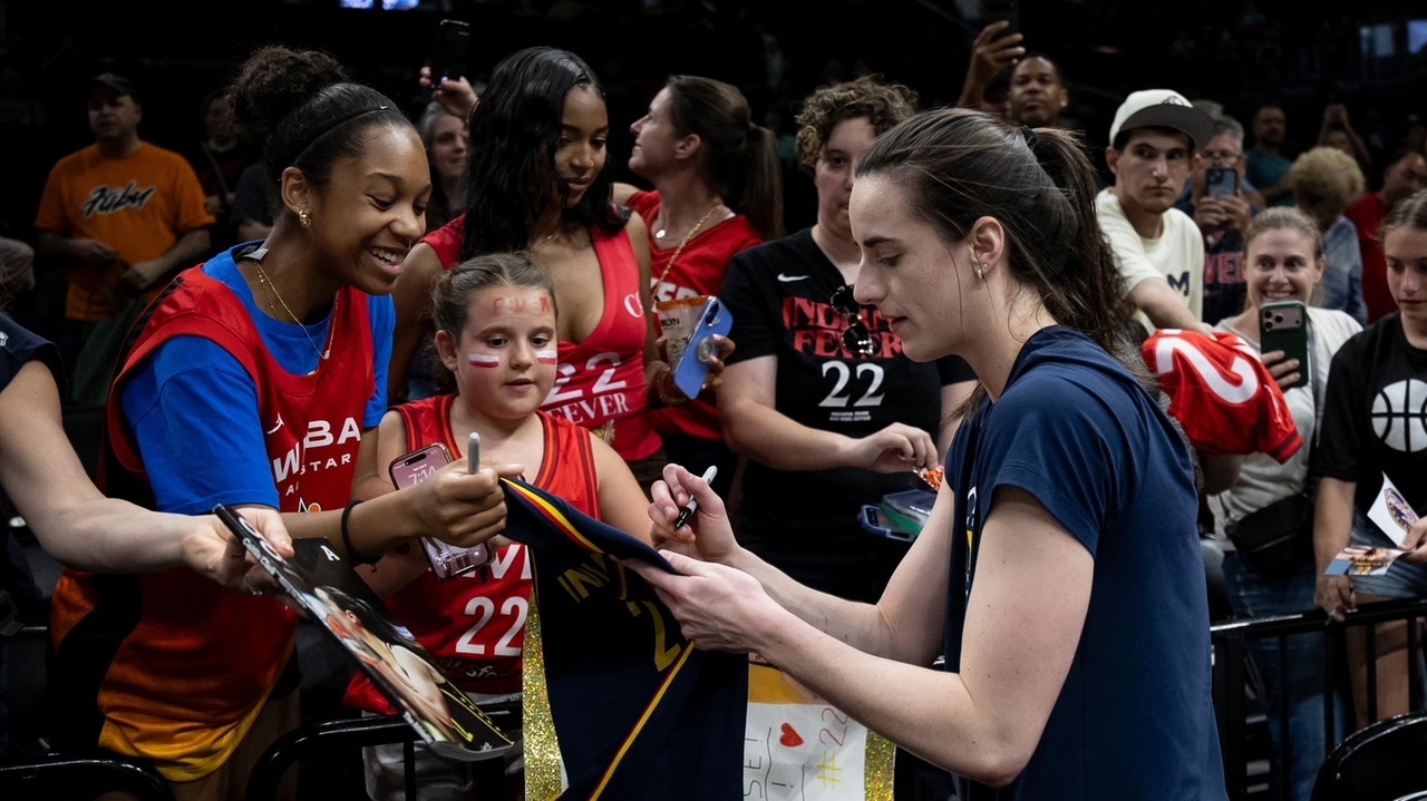 Liberty's Breanna Stewart helps club rally past Caitlin Clark, Fever