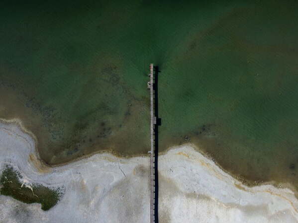 Low water is pictured at lake Chiemsee in Seebruck, Germany, Monday, June 8, 2026. (AP Photo/Matthias Schrader)