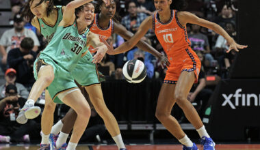 Breanna Stewart #30 of the New York Liberty loses the ball as she is fouled by Diamond Miller #1 of the Connecticut Sun (back) in the first quarter at Mohegan Sun Arena on June 8, 2026 in Uncasville, Connecticut.