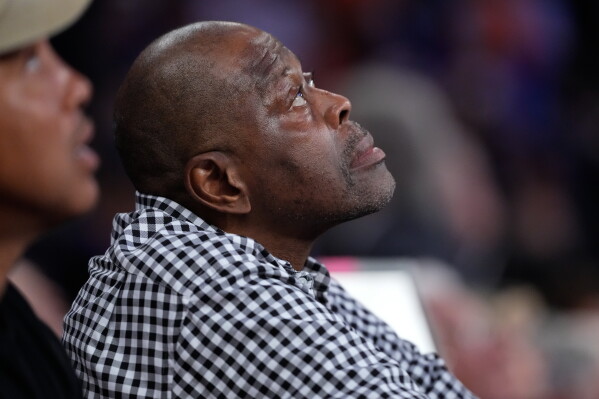New York Knicks Ambassador Patrick Ewing watches during second half of Game 3 of the NBA Finals basketball series against the San Antonio Spurs, Monday, June 8, 2026, in New York. (AP Photo/Ross D. Franklin)
