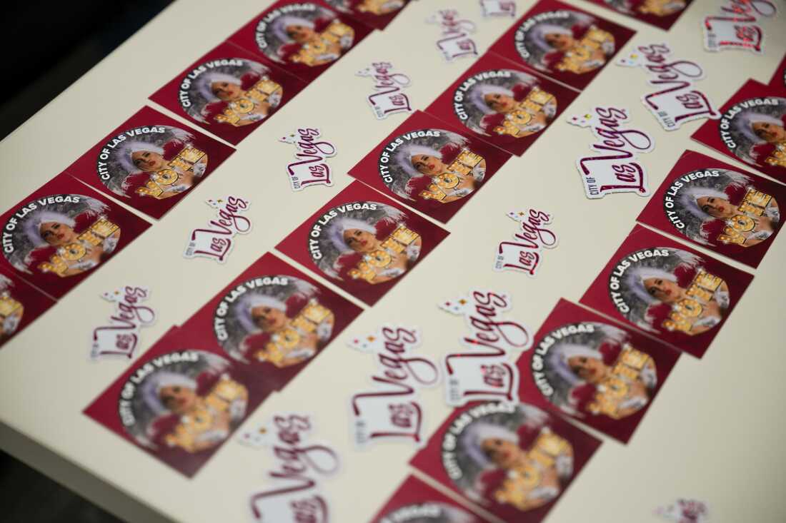 Voting stickers are displayed on a table at a polling place inside City Hall, Tuesday, Nov. 5, 2024, in Las Vegas.