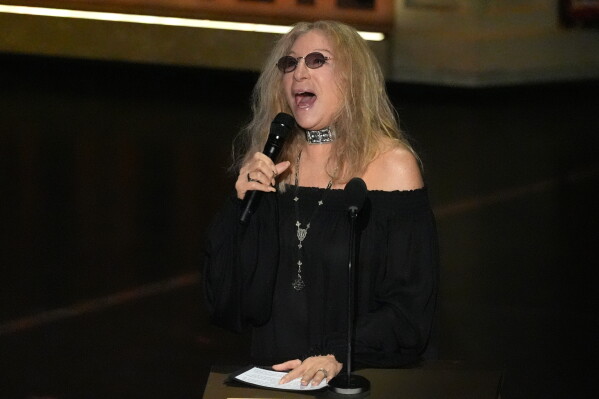 CORRECTS THE SPELLING OF STREISAND - Barbra Streisand speaks about Robert Redford during the In Memoriam segment during the Oscars on Sunday, March 15, 2026, at the Dolby Theatre in Los Angeles. (AP Photo/Chris Pizzello)