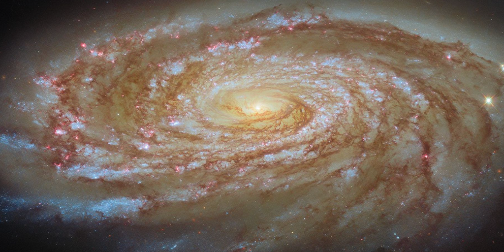 NASA’s Hubble telescope captures image of an active spiral galaxy on a journey