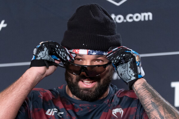 UFC heavyweight fighter Josh Hokit speaks to reporters during the UFC Freedom 250 media day, Wednesday, June 10, 2026, in Washington. (AP Photo/Manuel Balce Ceneta)