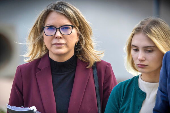 Rebecca Grossman, left, and her daughter head to Van Nuys Courthouse in the Van Nuys section of Los Angeles on Feb. 14, 2024. (Irfan Khan/Los Angeles Times via AP, FILE)