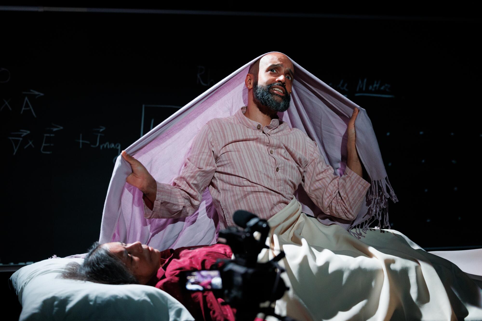 Shayok Misha Chowdhury, in rear, and Bulbul Chakraborty in "Rheology" at REDCAT.