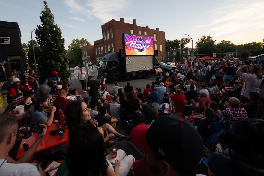 United States fans sit in disbelief after a stream of the USMNT vs. Paraguay cuts out after a power issue during a FIFA World Cup watch party outside of Amsterdam Tavern on Friday, June 12, 2026, in south St. Louis.
