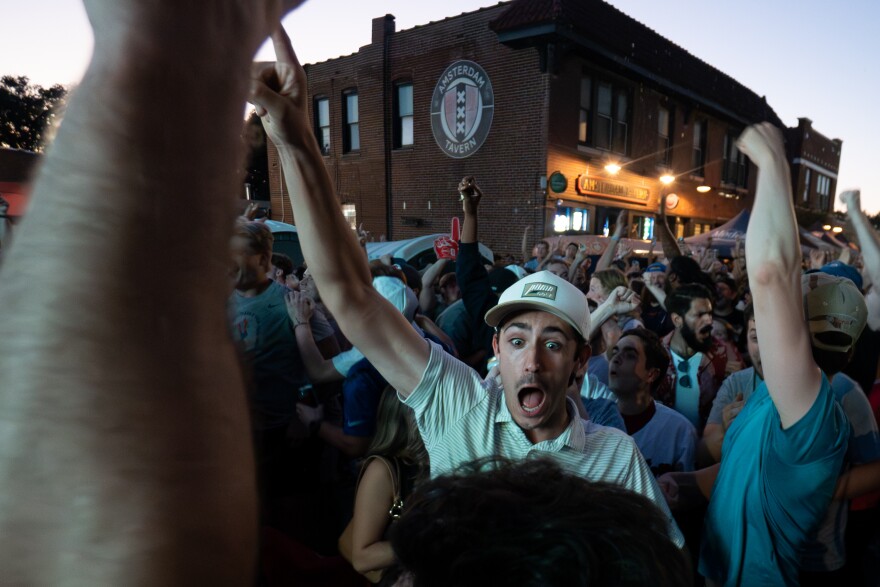 United States fans celebrate as the team routs Paraguay, 4-1, during a FIFA World Cup watch party outside of Amsterdam Tavern on Friday, June 12, 2026, in south St. Louis.