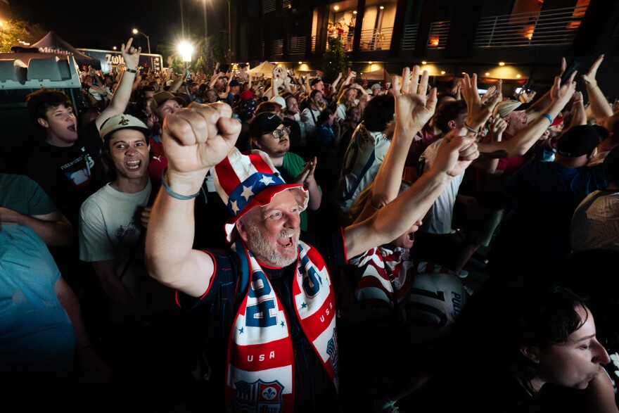 United States fans celebrate as the team routs Paraguay, 4-1, during a FIFA World Cup watch party outside of Amsterdam Tavern on Friday, June 12, 2026, in south St. Louis.