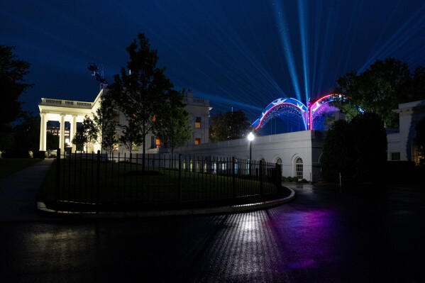 The arena is lit before the UFC Freedom 250 fights on the South Lawn of the White House, Thursday, June 11, 2026, in Washington. (AP Photo/Alex Brandon)