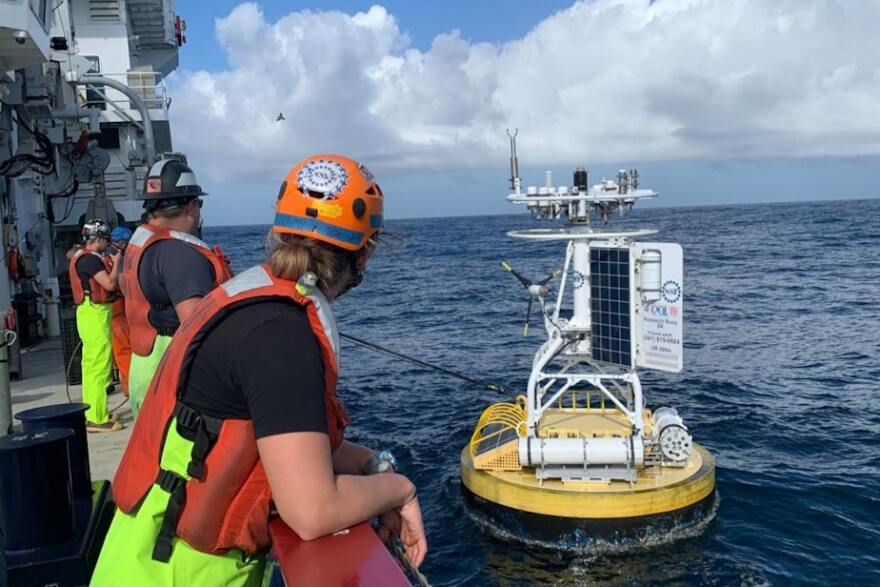 Researchers retrieve an Ocean Observatories Initiative buoy off the Pacific Northwest coast in September 2025.