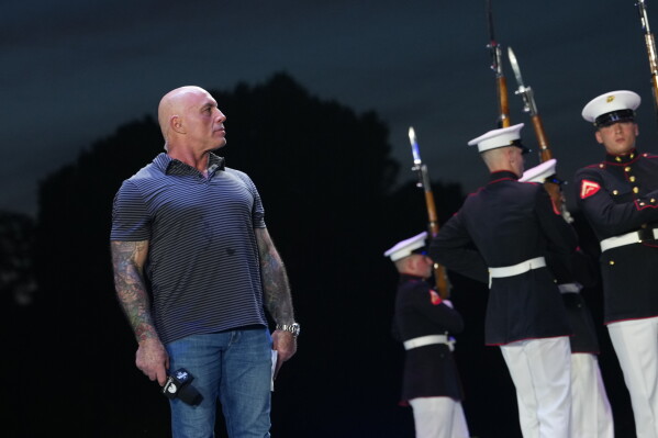 UFC commentator Joe Rogan during the ceremonial UFC Freedom 250 weigh-ins on the Ellipse, Saturday, June 13, 2026, in Washington, ahead of Sunday's fight on the South Lawn of the White House. (AP Photo/Julia Demaree Nikhinson)