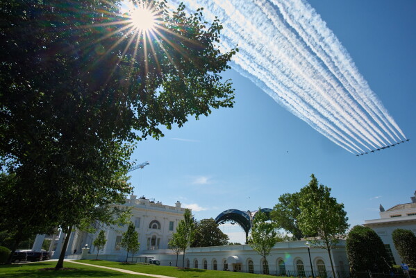 Thunderbirds and Blue Angels do a practice flyover of the White House, Octagon and Washington Monument, Friday, June 12, 2026, in Washington, ahead of the UFC fight. (AP Photo/Jacquelyn Martin)
