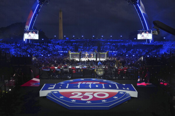 Featherweight fighters Diego Lopez and Steve Garcia in the ring during the first fight at UFC Freedom 250 on the South Lawn of the White House, Sunday, June 14, 2026, in Washington. (AP Photo/Julia Demaree Nikhinson)