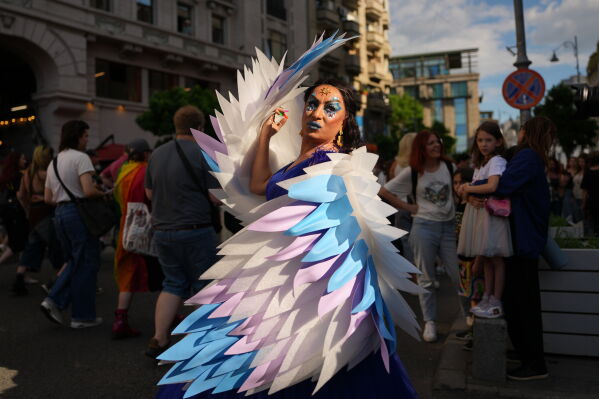 Antonella Lerca Duda, who identifies as a Roma transgender woman, strikes a pose before the start of the Bucharest Pride Parade, in Bucharest, Romania, Saturday, June 13, 2026. (AP Photo/Andreea Alexandru)