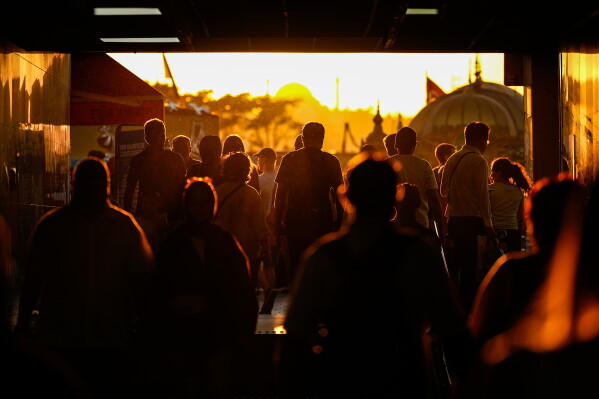 People walk along an underpass at Eminonu district in Istanbul, Turkey, Sunday, June 14, 2026.(AP Photo/Emrah Gurel)
