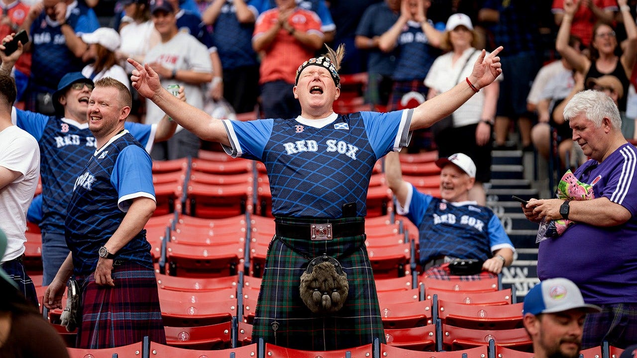 Scotland's Tartan Army soccer fans turned Red Sox game at Fenway Park into a party with bagpipes, singing