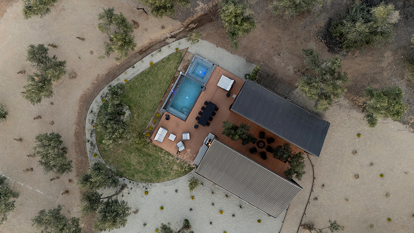 two corrugated metal volumes shelter courtyard retreat in mexico's desert landscape - 2