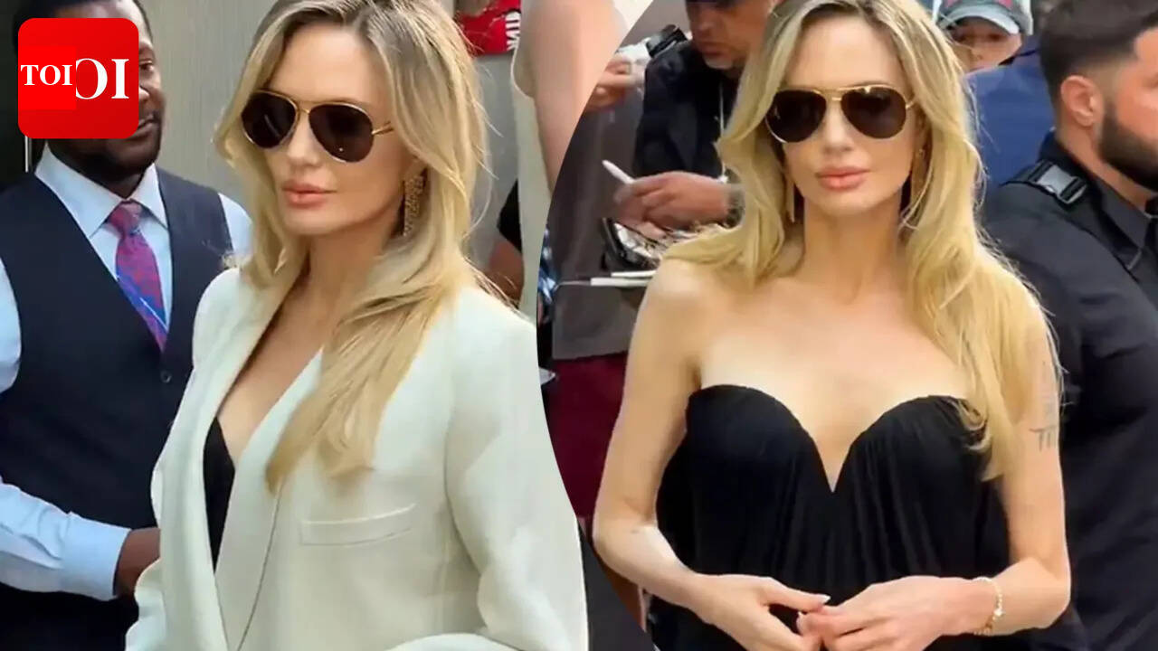 Angelina Jolie makes jaws drop at 'Couture' screening in New York; Actress shows off tattooed back in strapless gown - WATCH﻿ |