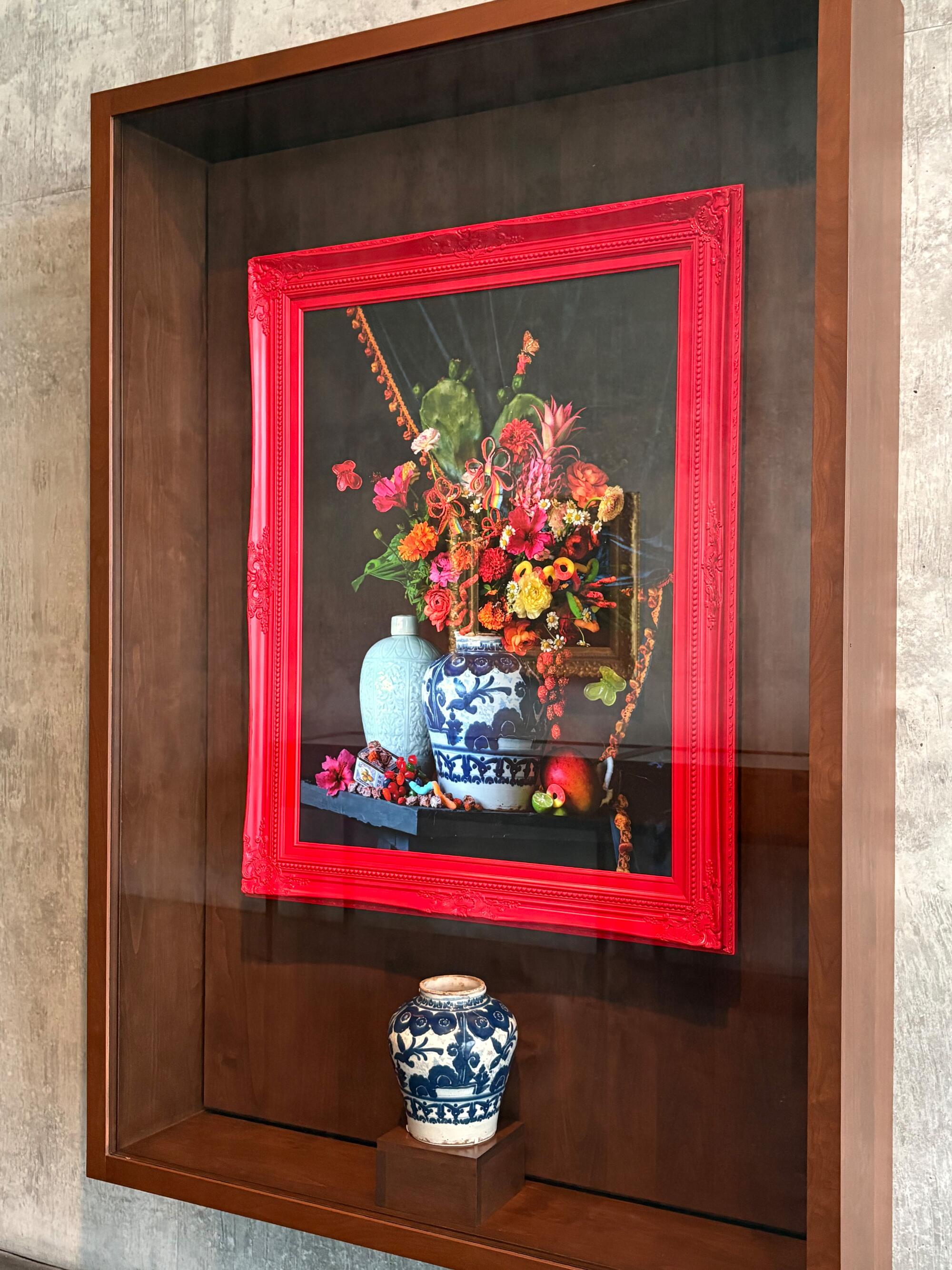 Installation of Stephanie Shih's 梅國 (Still life with chamoy and Dirty T Tamarindo) (2025- 26) and (bottom) Jar (c. 1700-50).