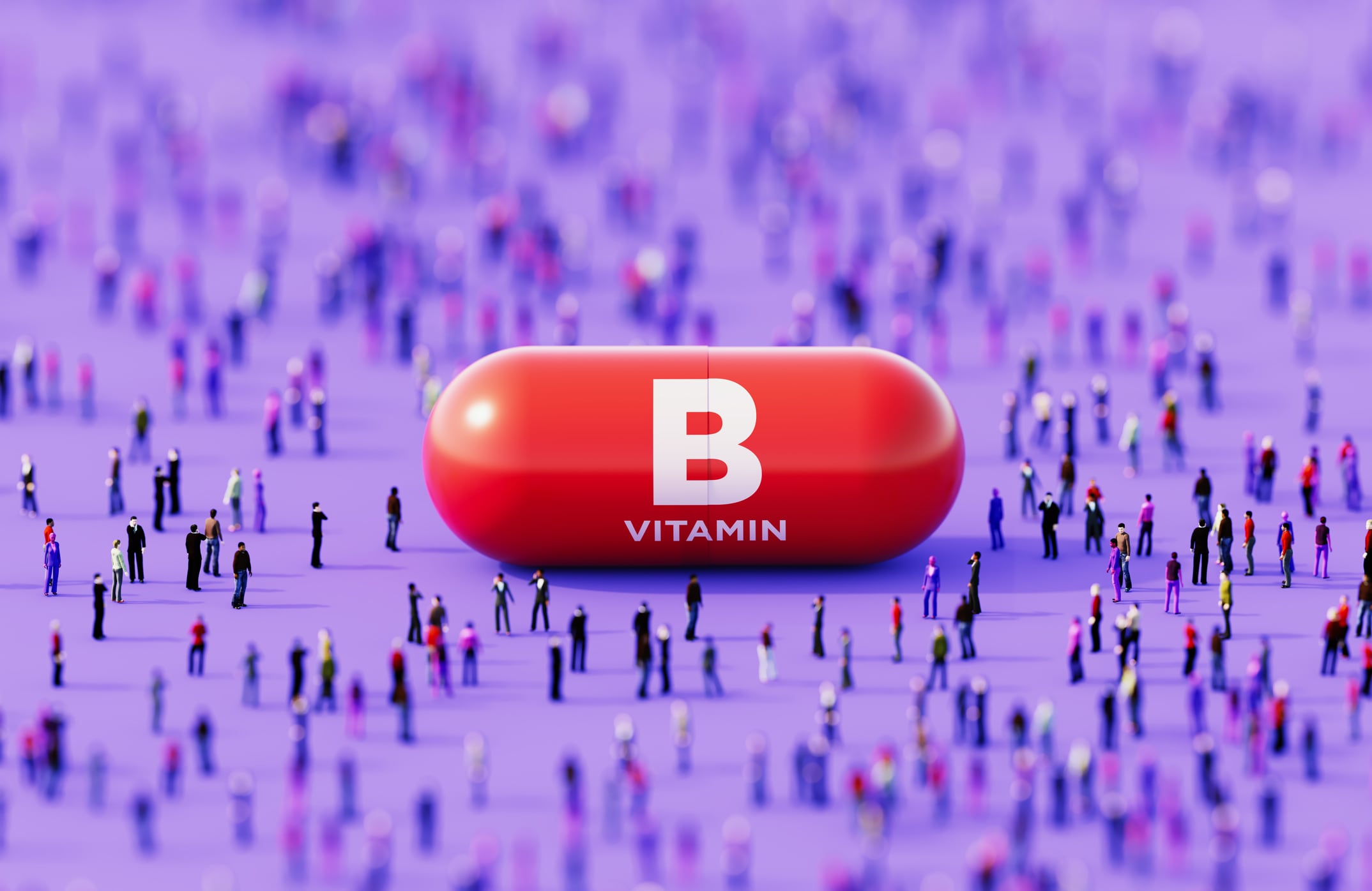 Red vitamin B pill surrounded by crowd of people on purple background. Healthy lifestyle concept.