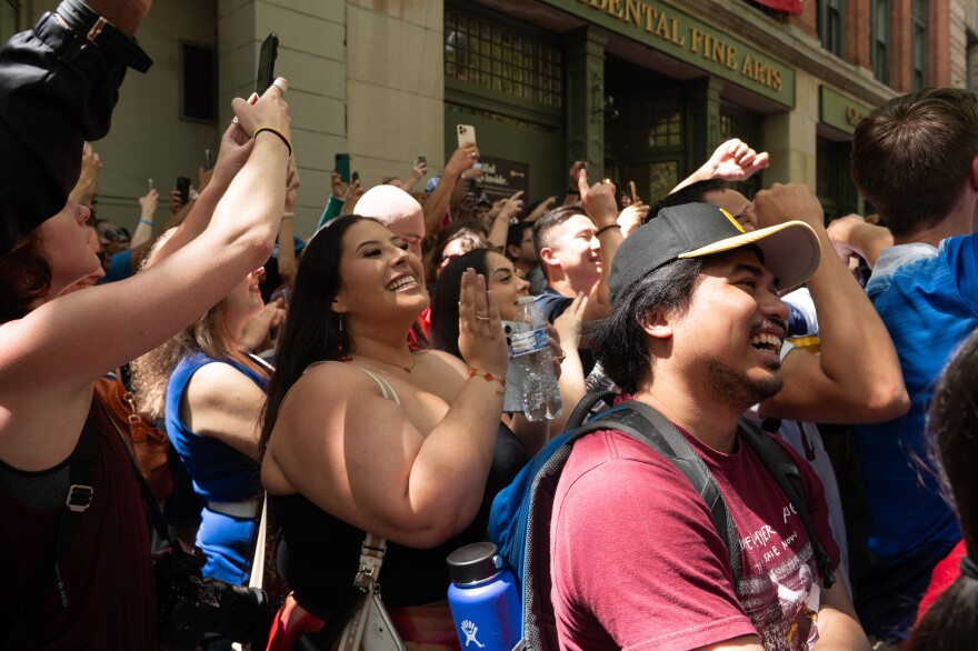 People cheering.