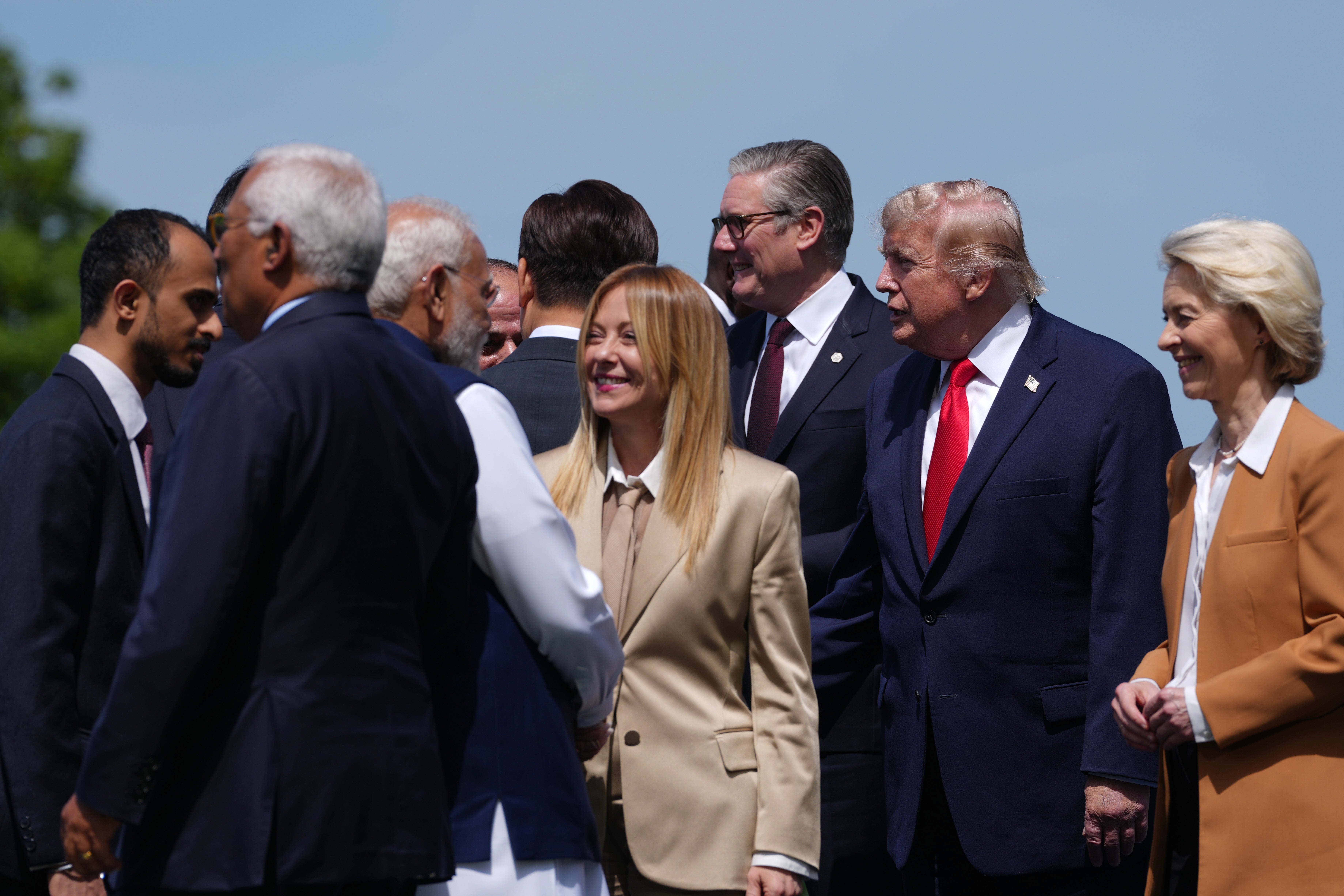 From right, European Commission President Ursula von der Leyen, U.S. President Donald Trump, British Prime Minister Keir Starmer, Italian Prime Minister Giorgia Meloni and India's Prime Minister Narenda Modi during a group photo of G7 leaders and invited nations during the G7 summit in Evian-les-Bains, France