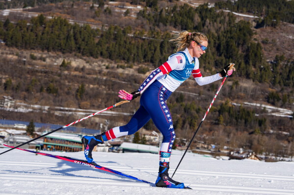 Jessie Diggins, of the United States, competes in the cross country skiing women's 50-kilometer mass start classic at the 2026 Winter Olympics, in Tesero, Italy, Feb. 22, 2026. (AP Photo/Kirsty Wigglesworth, File)