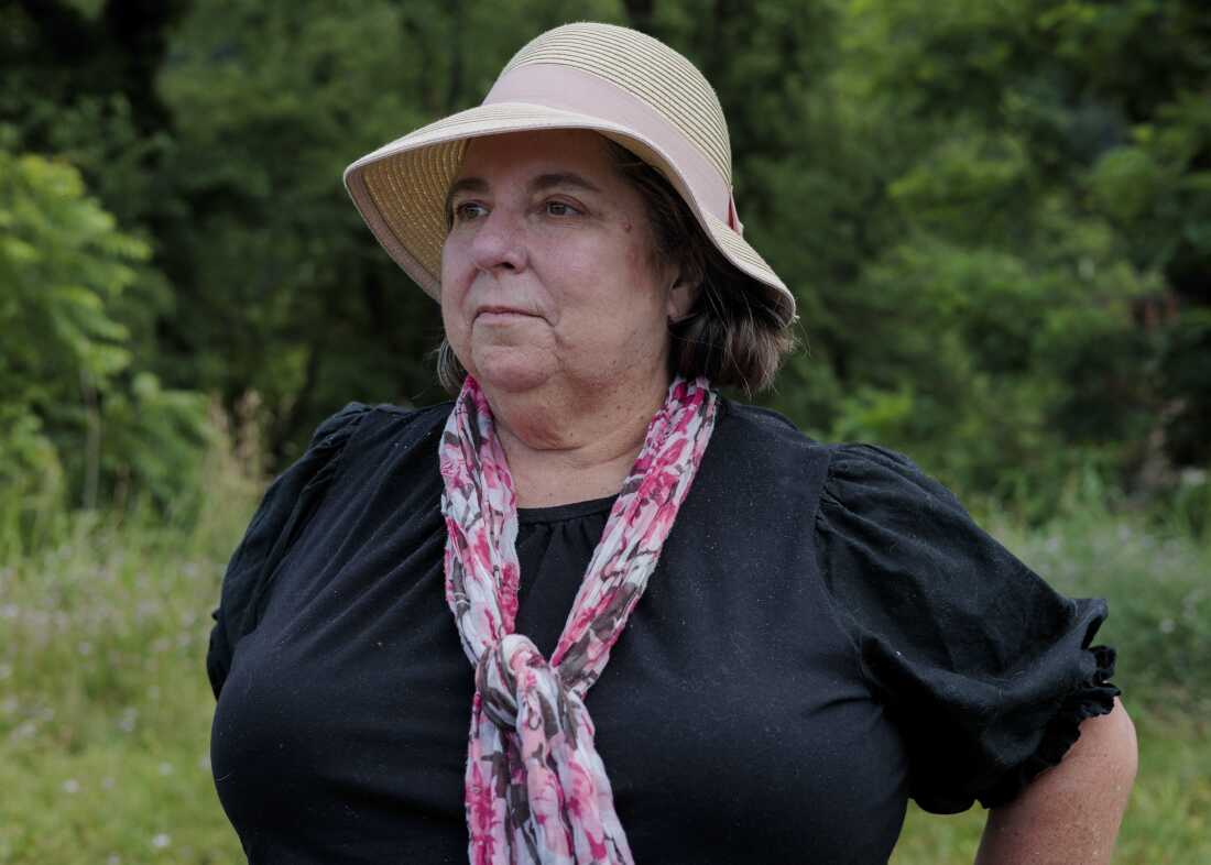 Elizabeth Kerwin, 58, poses for a photo ahead of the America 433 pop up event at Harpers Ferry National Park. Kerwin spent the last three years working on a new park exhibit about African-American history, which was cancelled due to new federal guidelines. 