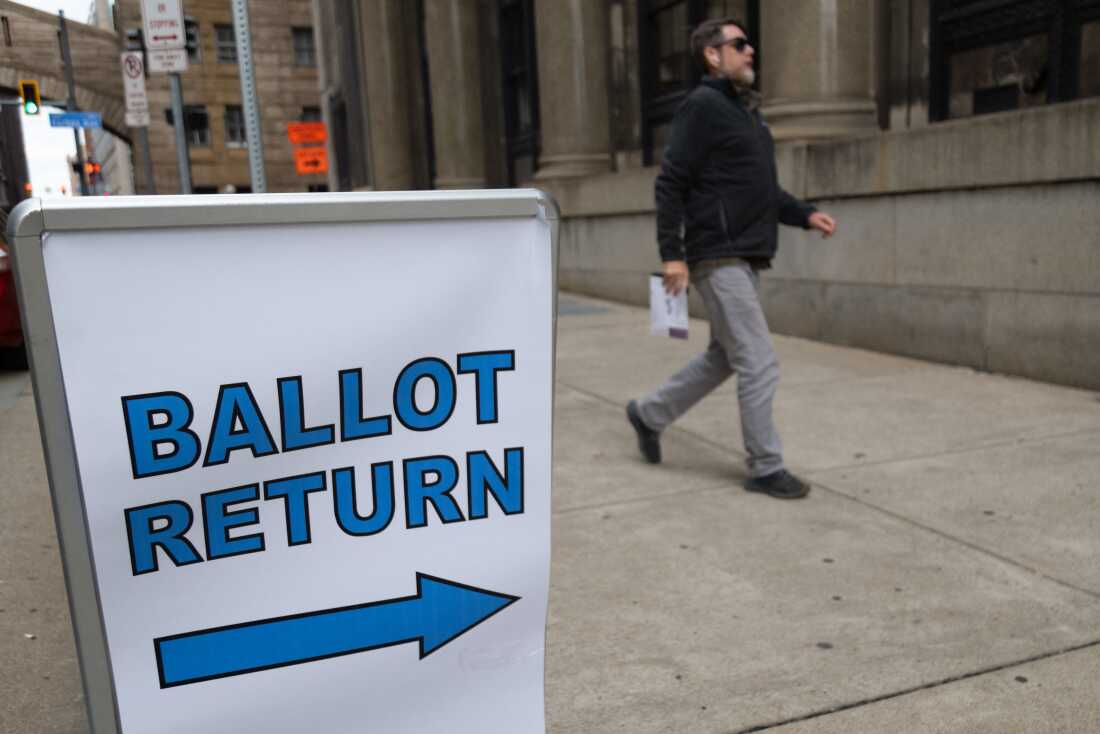 Voters drop off their mail-in ballots in Pittsburgh, Pa., on Nov. 4, 2024.