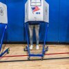 A voter casts their ballot at a polling station in Manhattan's Tribeca neighborhood as New Yorkers head to the polls on June 23 in New York City.