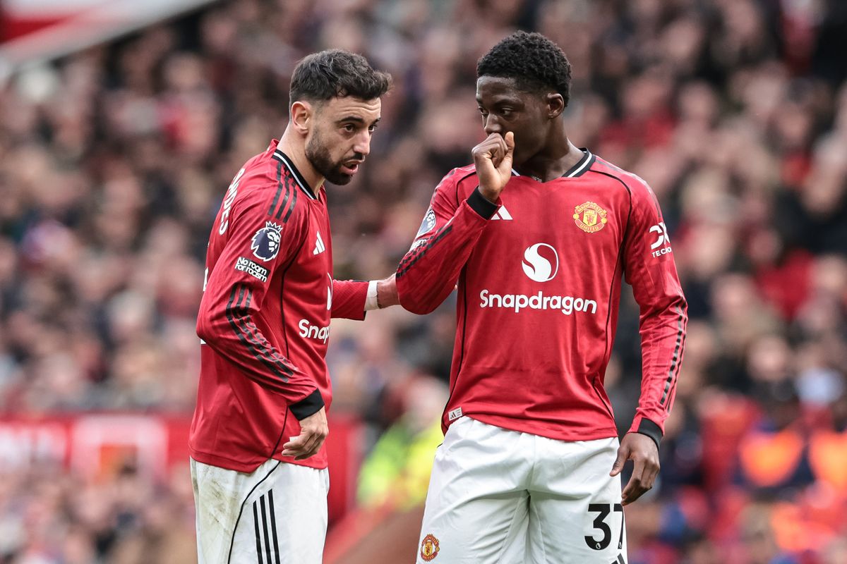 Bruno Fernandes of Manchester United speaks to Kobbie Mainoo of Manchester United during the Premier League match between Manchester United and Crystal Palace at Old Trafford in Manchester, United Kingdom, on March 1, 2026.