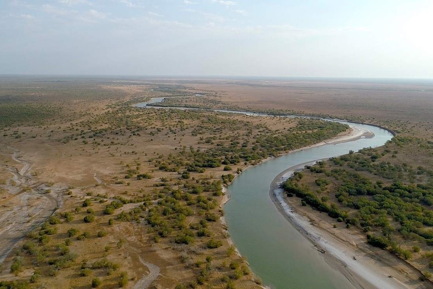 A river snakes its way through the Australian outback
