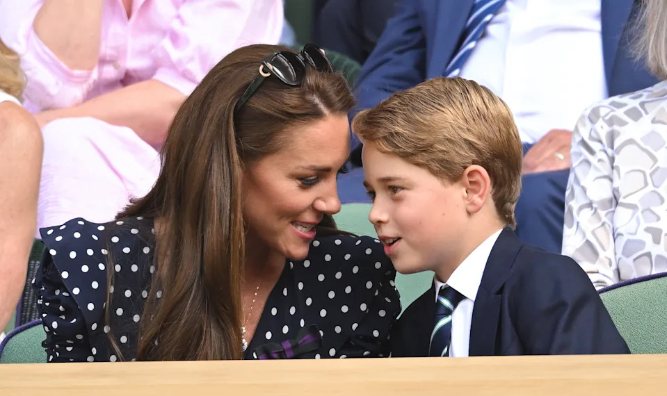 Kate and Prince George,  among seated spectators.