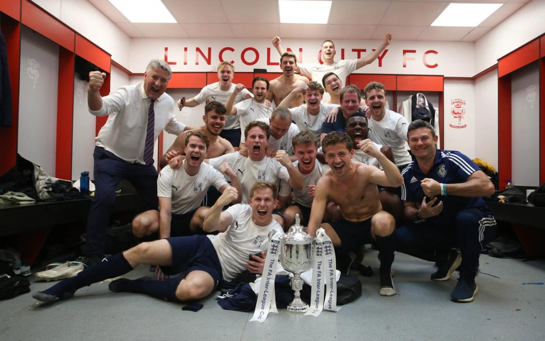 The Arthurian League representative team celebrates after defeating the West Yorkshire Association Football League representative team in the 2023–24 FA Inter-League Cup Final at Lincoln City FC’s Sincil Bank Stadium in Lincoln, England, on May 5, 2024. (Photo by Andy Nunn/The Arthurian League)