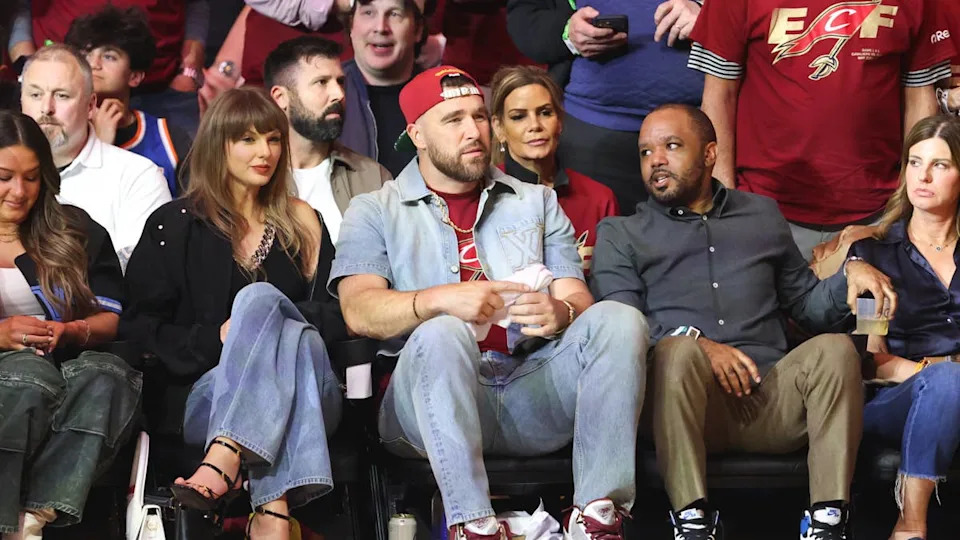 May 23, 2026; Cleveland, Ohio, USA; Taylor Swift and Travis Kelce look on during game three of the eastern conference finals for the 2026 NBA playoffs between the New York Knicks and <a class="link " href="https://sports.yahoo.com/nba/teams/cleveland/" data-i13n="sec:content-canvas;subsec:anchor_text;elm:context_link" data-ylk="slk:Cleveland Cavaliers;sec:content-canvas;subsec:anchor_text;elm:context_link;itc:0" data-yga="{"yLinkElement":"context_link","yModuleName":"content-canvas","yLinkText":"Cleveland Cavaliers","ySubModuleName":"anchor_text","yHasCommerce":false}">Cleveland Cavaliers</a> at Rocket Arena. Mandatory Credit: Scott Galvin-Imagn Images© Scott Galvin-Imagn Images&period;