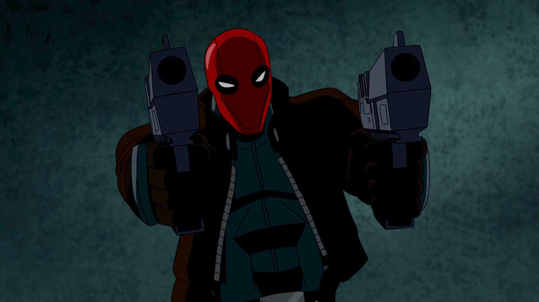 Red Hood pulls out two guns in Batman: Under the Red Hood.