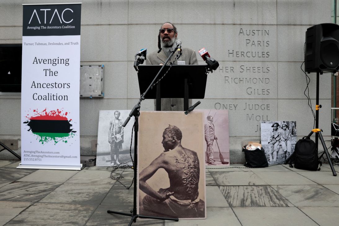 Michael Coard, attorney and founder of the Avenging the Ancestors Coalition, speaks after National Park Service workers temporarily reinstalled a slavery exhibit at the President's House on February 19.