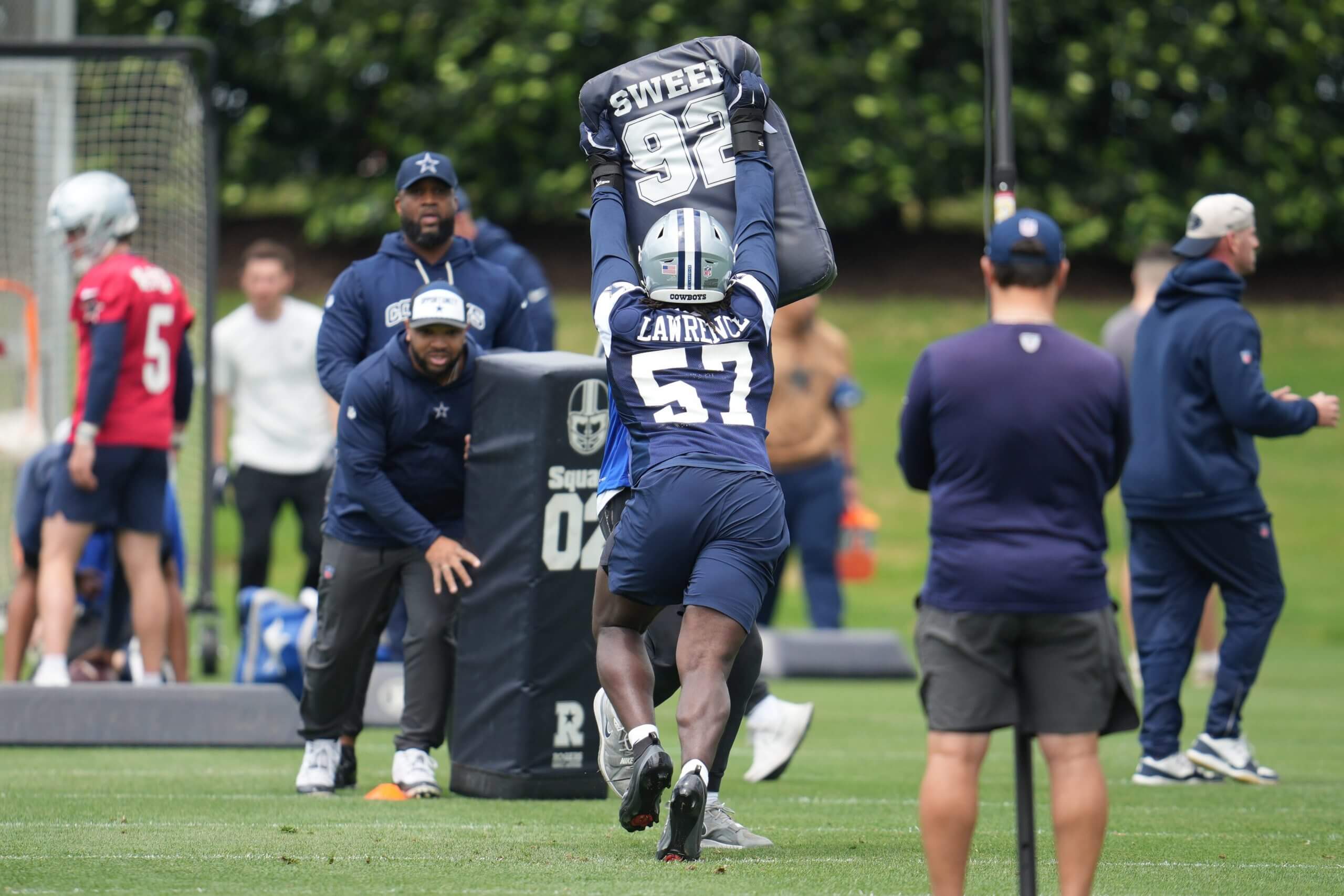 Dallas Cowboys linebacker Malachi Lawrence (57) goes through a drill during practice at the Ford Center at the Star Training Facility in Frisco, Texas. 