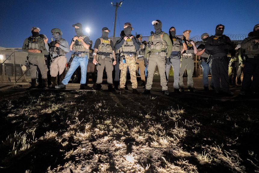 ICE agents and Enforcement and Removal Operations (ERO) officers stand guard outside Delaney Hall detention facility after multiple clashes with protestors last month.