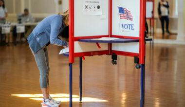 People vote during the primary election for U.S. Congress in New Jersey