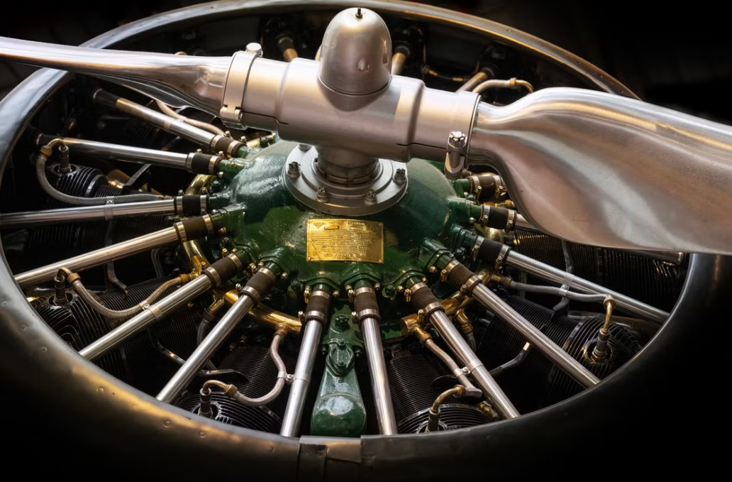 Detailed view of a vintage aircraft propeller engine in a Berlin museum.