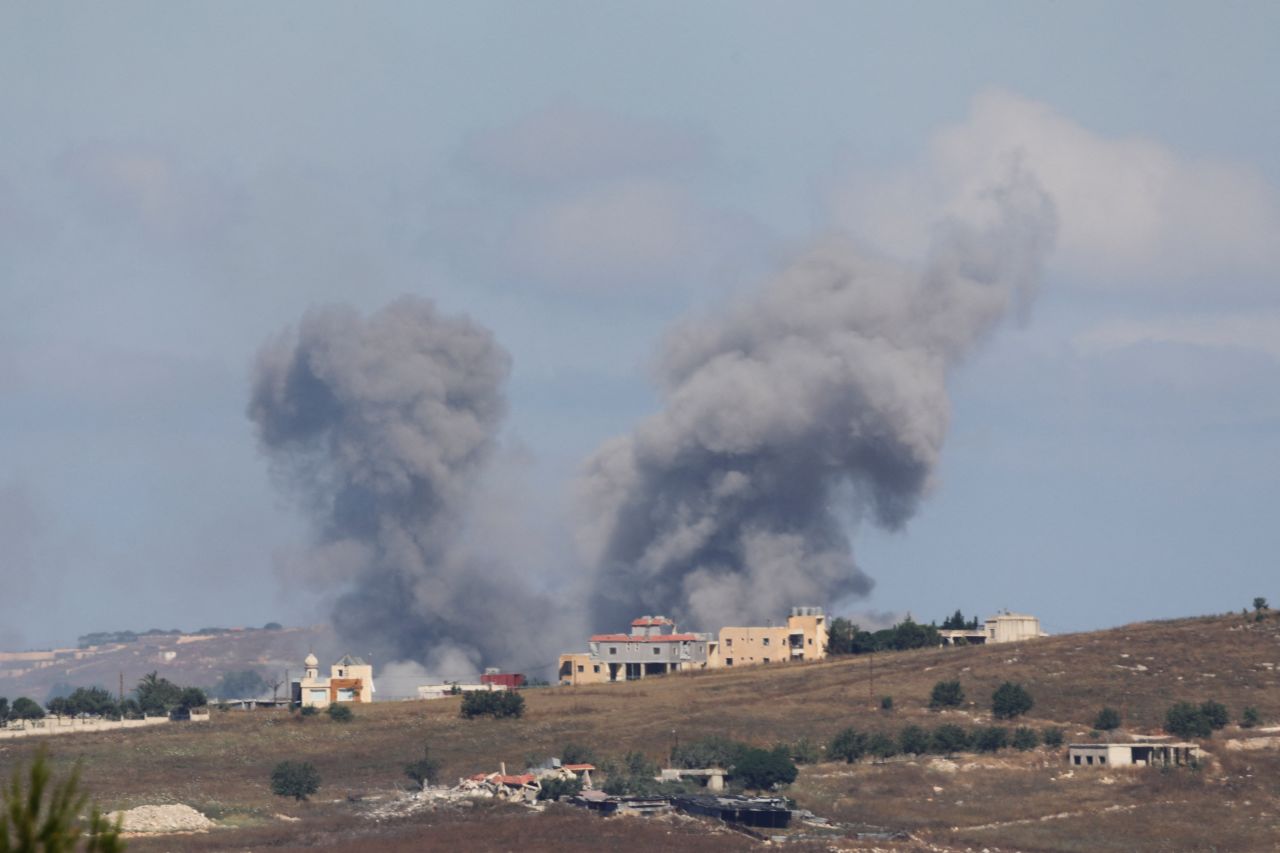 Smoke billows from southern Lebanon following an Israeli strike, as seen from Marjayoun, Lebanon, on Friday.