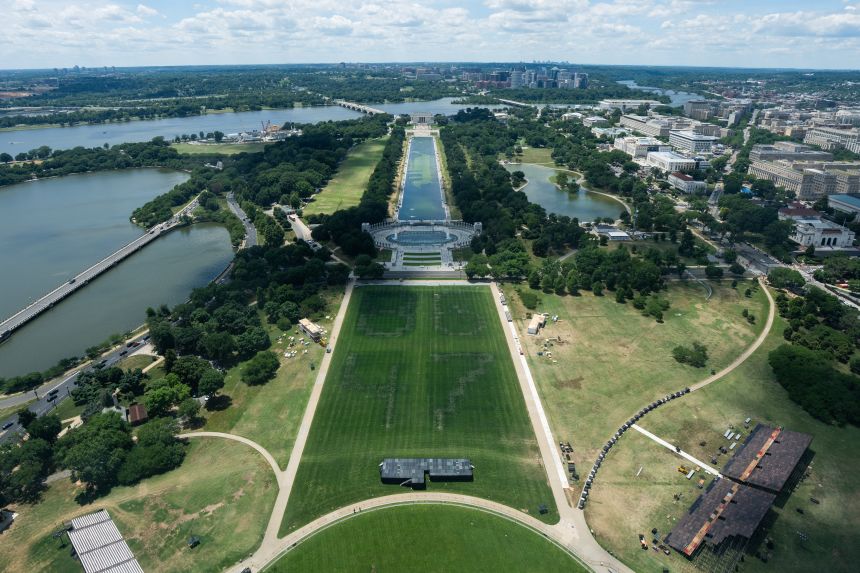 The remnants of markings depicting the numbers 8647 near the Lincoln Memorial Reflecting Pool in Washington, DC, on June 19, 2026.