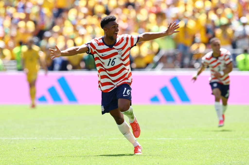 Alex Freeman of the U.S. celebrates scoring their second goal.