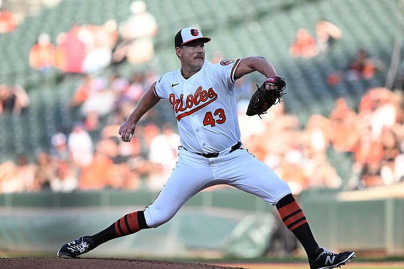 Baltimore Orioles' Trey Gibson delivers against the Seattle Mariners in the first inning of a baseball game, Monday, June 8, 2026, in Baltimore. (AP Photo/Gail Burton)