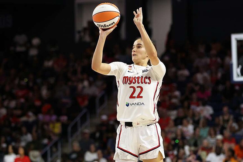 FILE - Washington Mystics guard Sonia Citron (22) takes a shot during the second half of a WNBA basketball game against the New York Liberty, May 10, 2026, in Washington. (AP Photo/Daniel Kucin Jr., File)