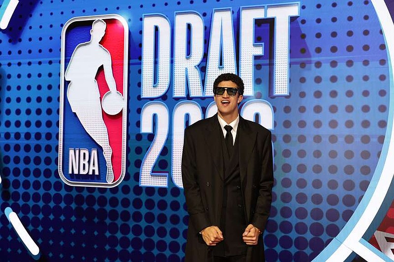 Karim López arrives for the first round of the NBA basketball draft Tuesday, June 23, 2026, in New York. (AP Photo/Adam Hunger)